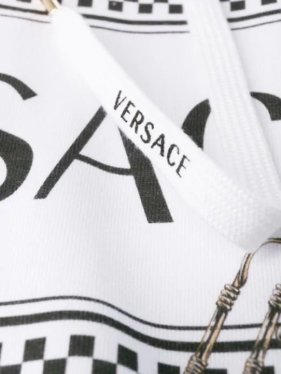Shop Versace Logo Safety Pin Hoodie In White