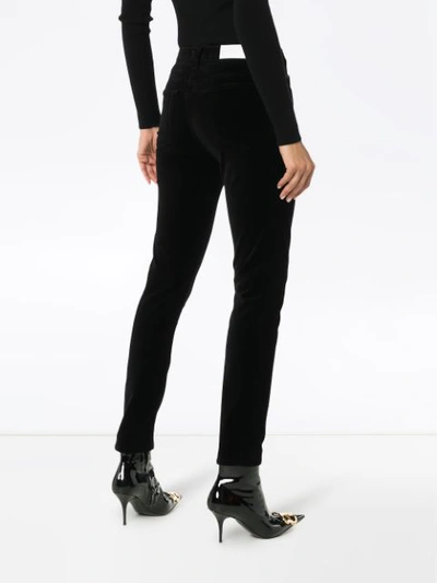 Shop Re/done Velvet Skinny Trousers In Black