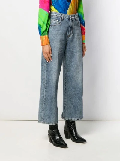 Shop Msgm Cropped Distressed Jeans In Blue