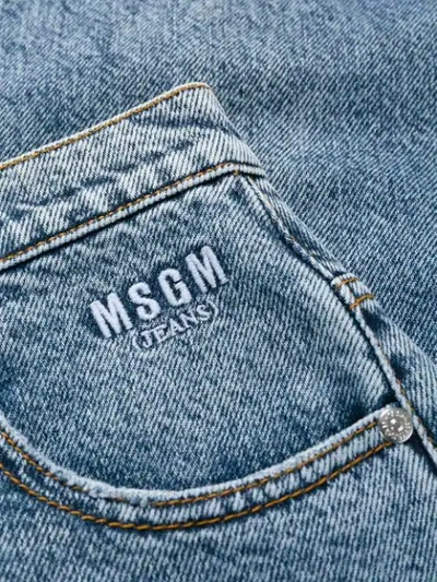 Shop Msgm Cropped Distressed Jeans In Blue