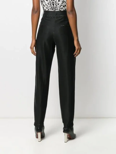 Shop Balmain Lamé Tapered Trousers In Black