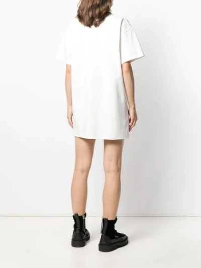 Shop Moschino Printed Logo T-shirt Dress In White