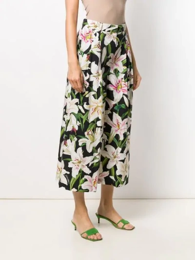 Shop Dolce & Gabbana Cropped Floral Print Trousers In Black