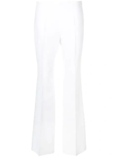 Shop Michael Kors Flared Tailored Trousers In White