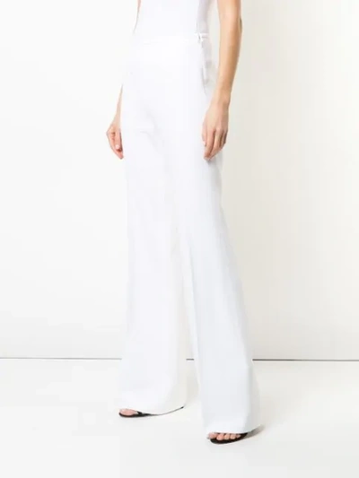 Shop Michael Kors Flared Tailored Trousers In White