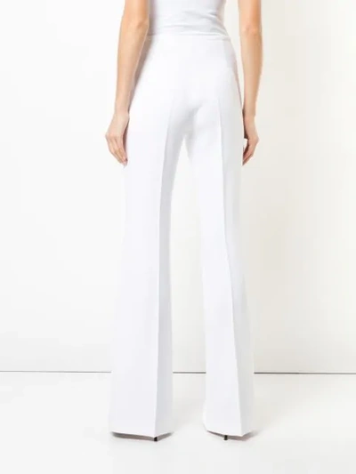 Shop Michael Kors Flared Tailored Trousers In White