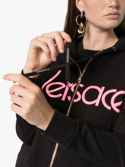 Shop Versace Logo-embroidered Zip-up Hoodie In Black