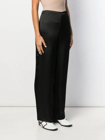 Shop Theory Palazzo Trousers In Black