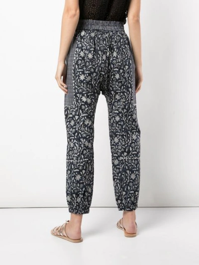 Shop Ulla Johnson Moonseed Floral Trousers In Blue