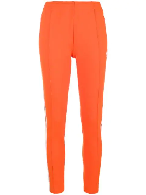 adidas sst track pants orange