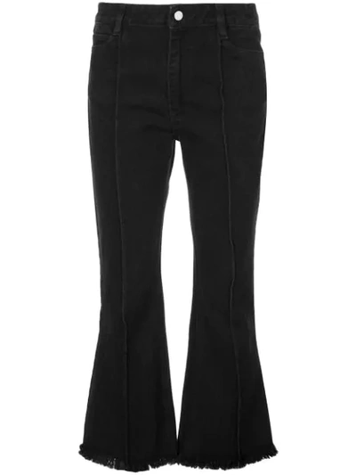 Shop Sandy Liang Cropped Flared Jeans In Black