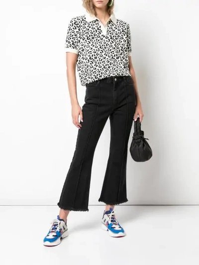 Shop Sandy Liang Cropped Flared Jeans In Black