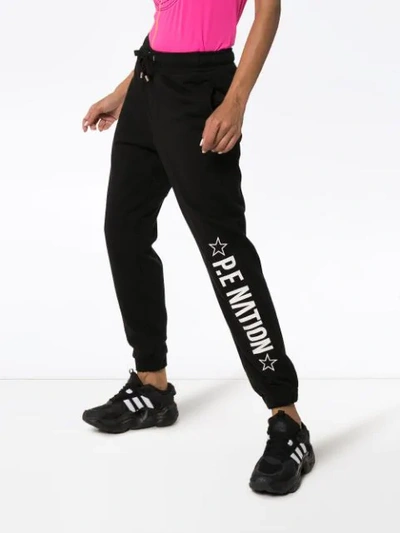 Shop P.e Nation Downclimb Logo-printed Sweatpants In Black