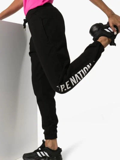Shop P.e Nation Downclimb Logo-printed Sweatpants In Black