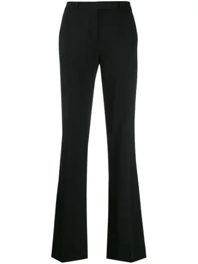 FLARED STYLE TROUSERS