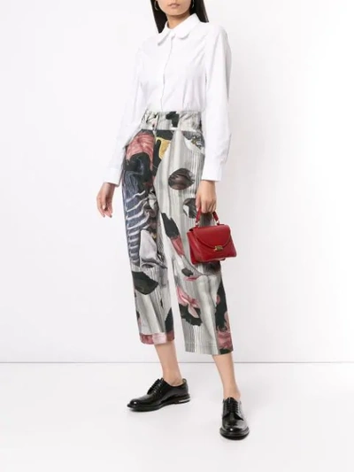 Shop Roberts Wood Collage Print Trousers In Green