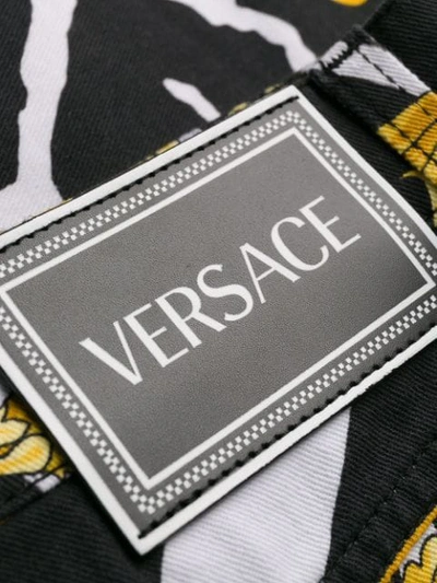 Shop Versace Savage Barocco Shorts In Black
