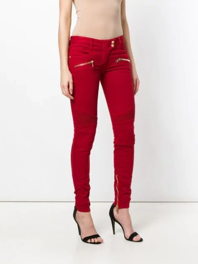 Shop Balmain Denim Biker Jeans In Red