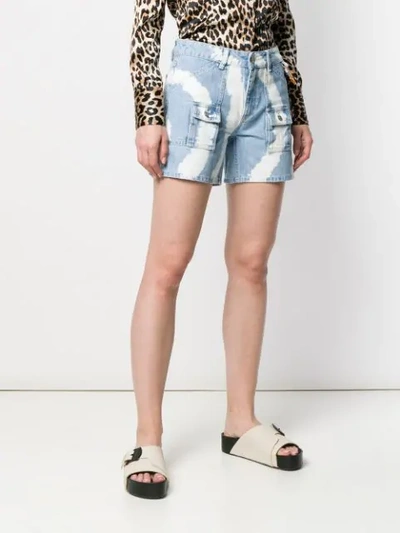 Shop Ganni Tie-dye Denim Shorts In Blue