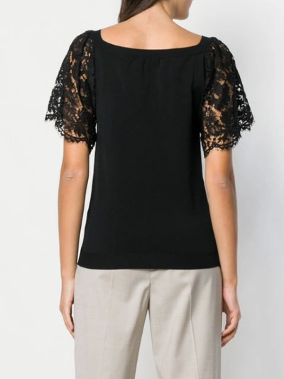 Shop Valentino Floral Lace Sleeve T In Black