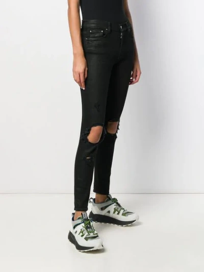 Shop Amiri Thrasher Minimal Skinny Jeans In Black