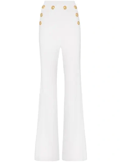 Shop Balmain High Waist Button Detail Flared Trousers In White