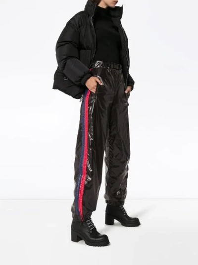 Shop Moncler Side-stripe Nylon Trousers In Black