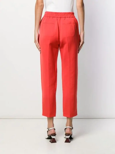 Shop Frenken Cropped Tapered Trousers In Red