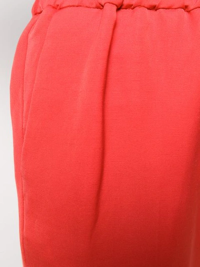 Shop Frenken Cropped Tapered Trousers In Red