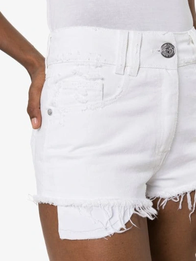 Shop Balmain Frayed Hem Denim Shorts In White