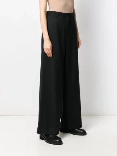 Shop The Row Palazzo Pants In Black