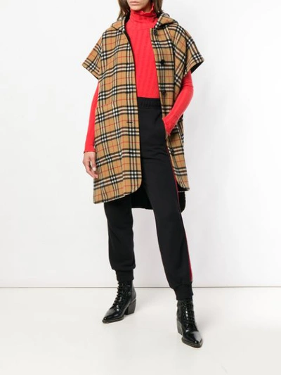 Shop Burberry Reversible Vintage Check Hooded Poncho In Black
