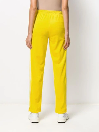 Shop Adidas Originals Firebird Tracksuit Bottoms In Yellow