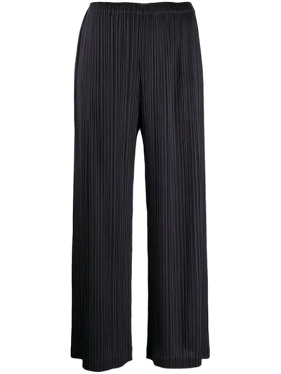 Shop Issey Miyake Cropped-length Pleated Trousers In Purple