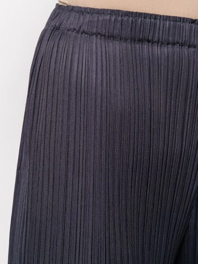 Shop Issey Miyake Cropped-length Pleated Trousers In Purple