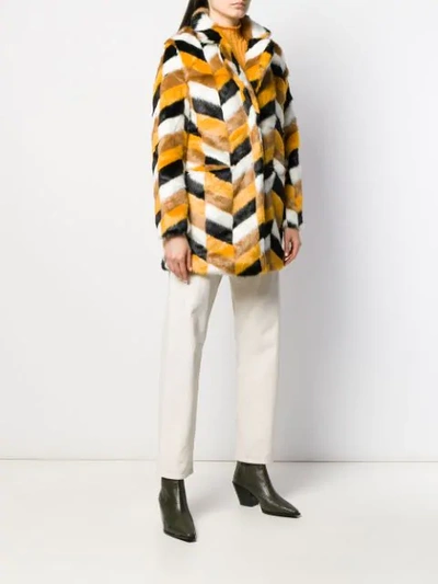 Shop Apparis Camille Faux-fur Chevron Coat In Yellow