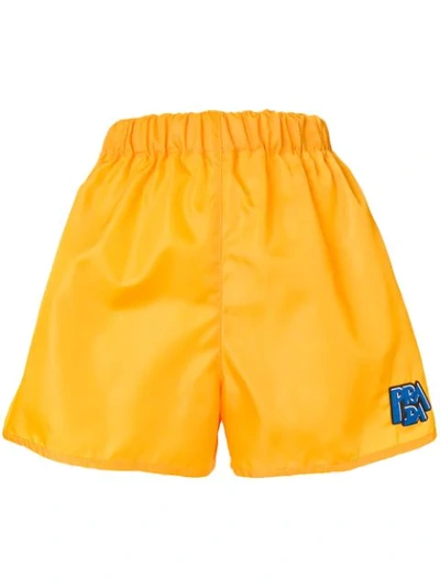 Shop Prada Logo Shorts In Yellow