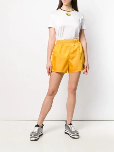 Shop Prada Logo Shorts In Yellow