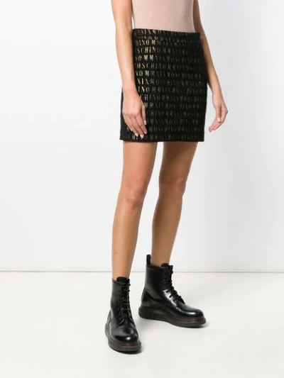 Shop Moschino All-over Logo Short Skirt In Black