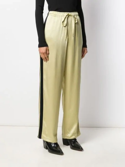Shop Haider Ackermann Drawstring Trousers In Yellow