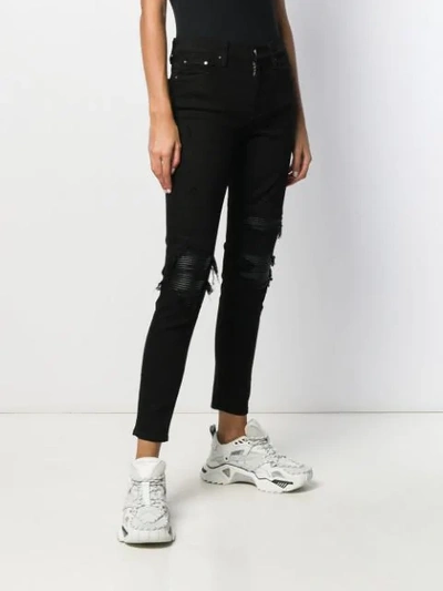 Shop Amiri Mx1 Contrast-patch Skinny Jeans In Black