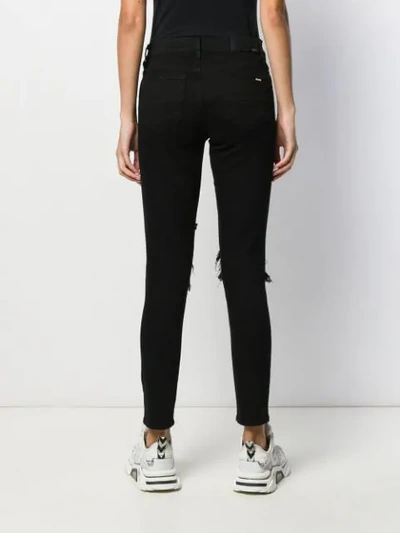 Shop Amiri Mx1 Contrast-patch Skinny Jeans In Black
