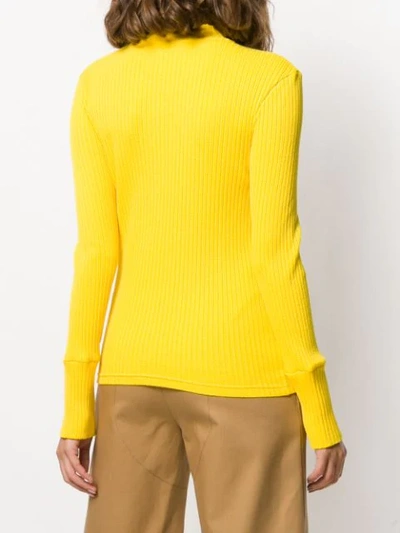 Shop Courrèges Gerippter Pullover In Yellow