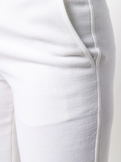 Shop Emilio Pucci High-waist Flared Trousers In White