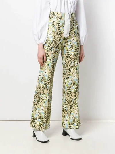 Shop Miu Miu Giraffe Print Trousers In Neutrals