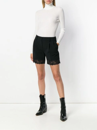 Shop Versace Turtle Neck Sweater - White
