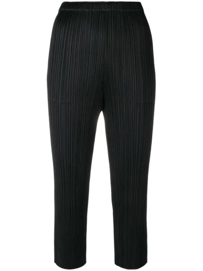 Shop Issey Miyake Pleated Cropped Trousers In Black