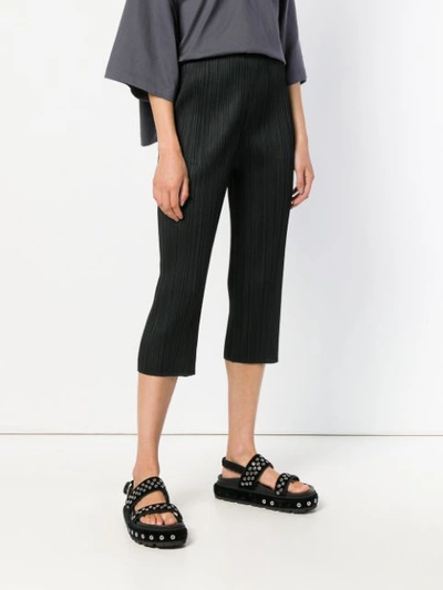Shop Issey Miyake Pleated Cropped Trousers In Black
