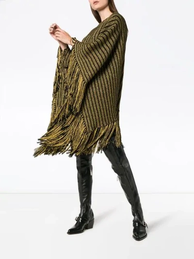 Shop Saint Laurent Fringed Hem Metallic Poncho In Black