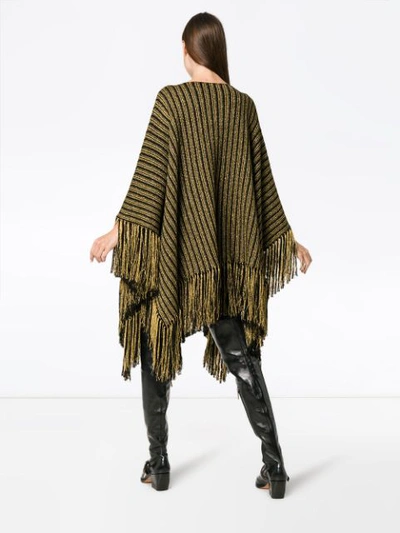 Shop Saint Laurent Fringed Hem Metallic Poncho In Black